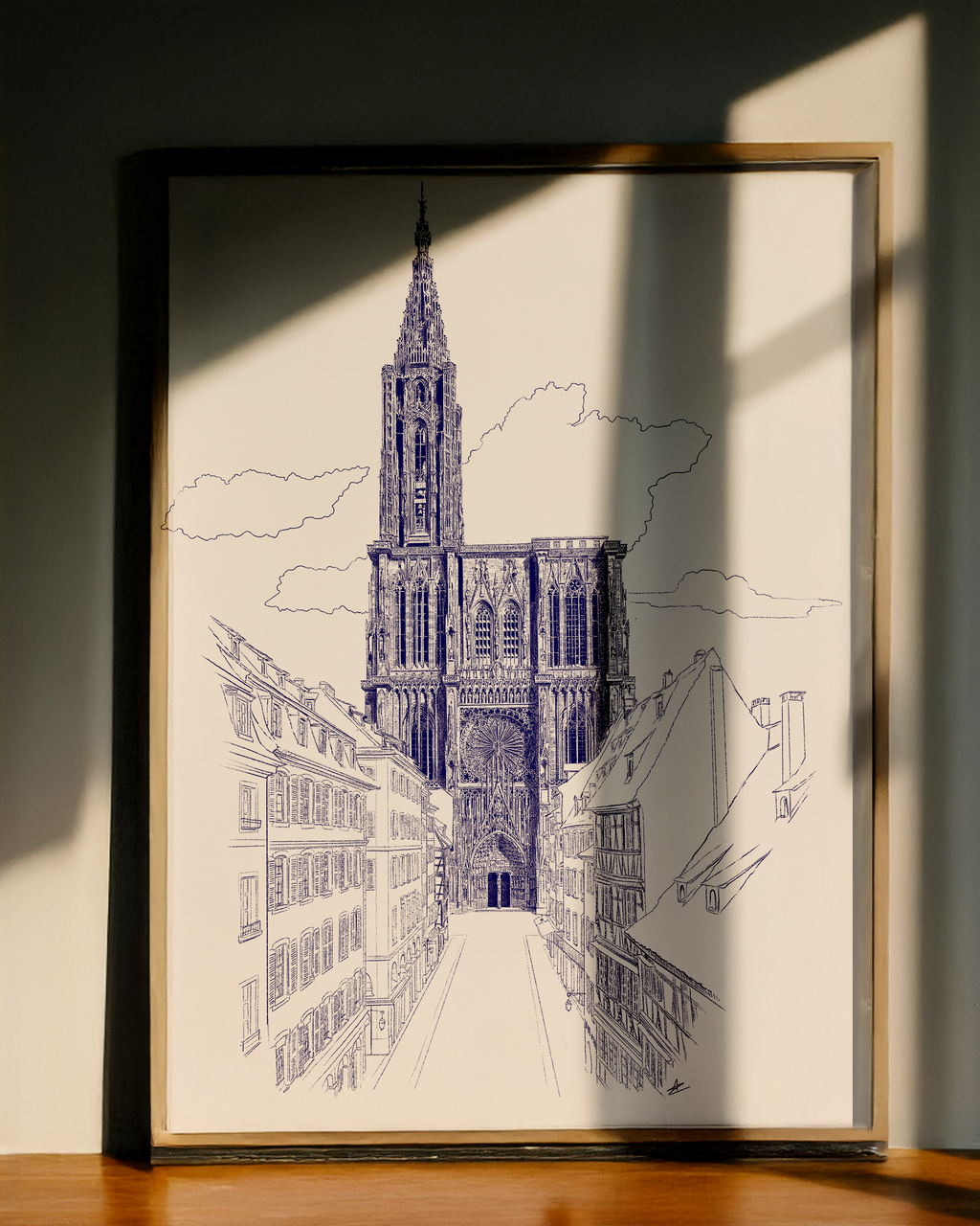 dessin au trait bleu de la cathédrale de Strasbourg encadrée